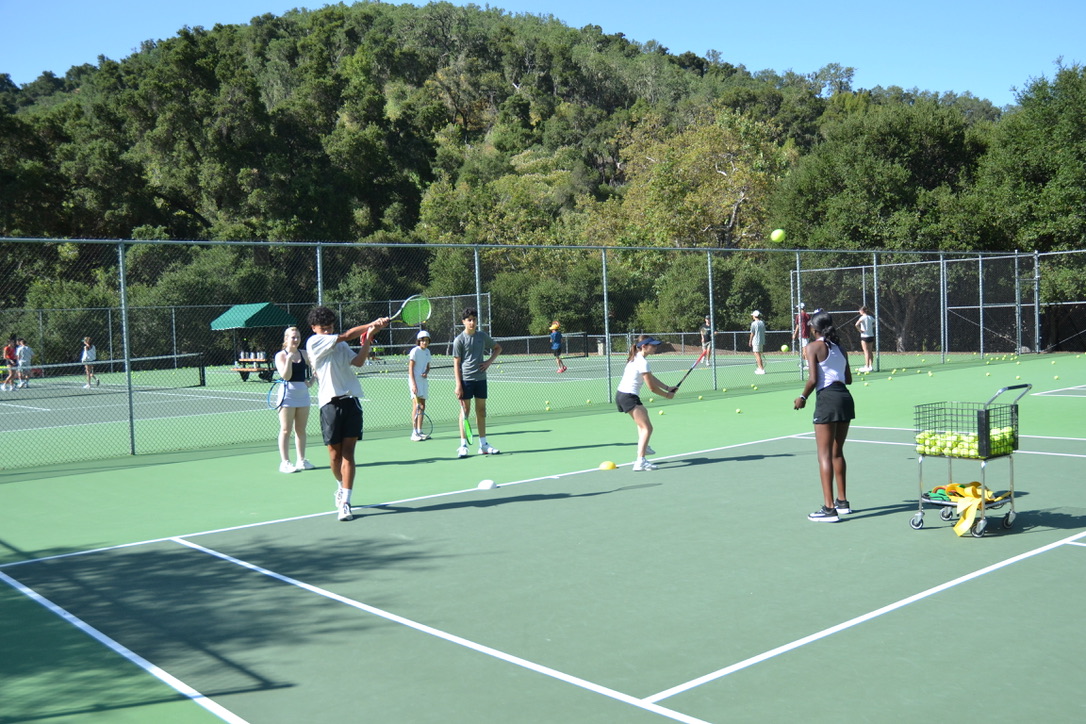 Kids playing tennis